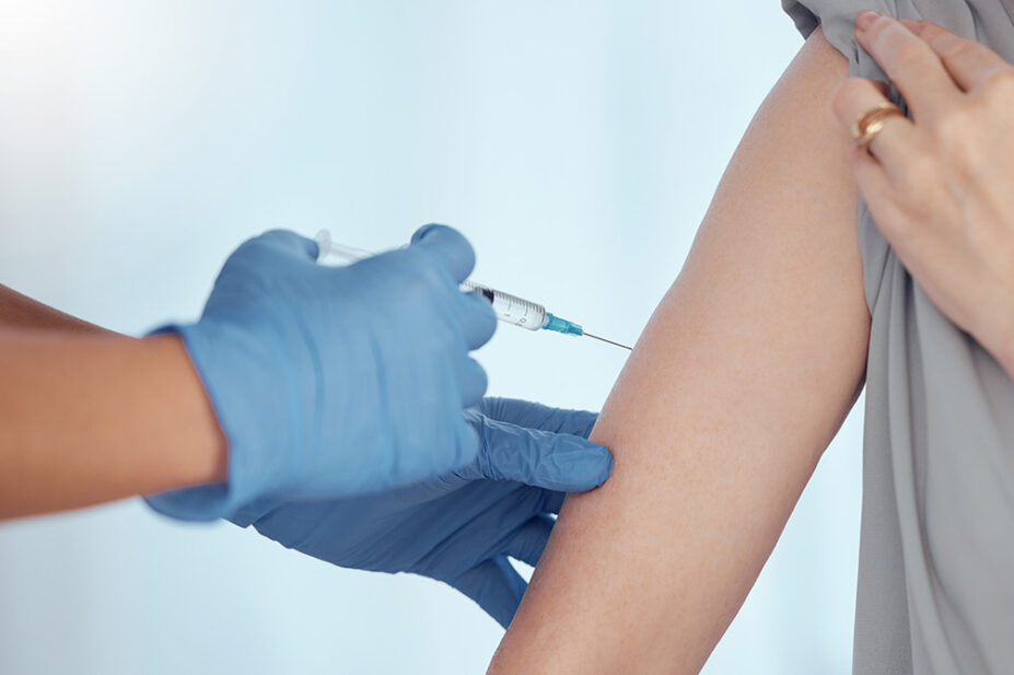 A patient receives a vaccination