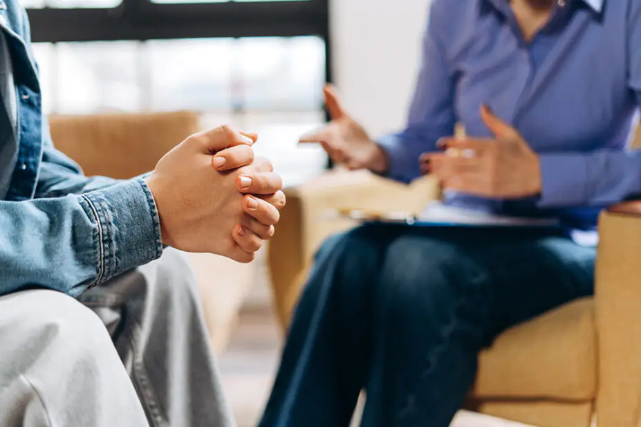 A teenager consults with a healthcare professional