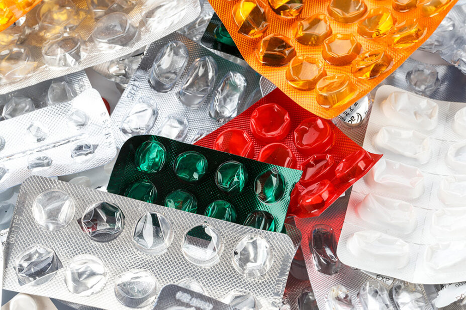 A assortment of empty blister packs of medicines