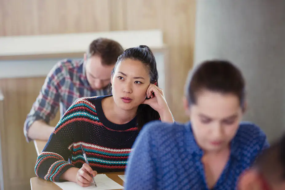 University students take an exam