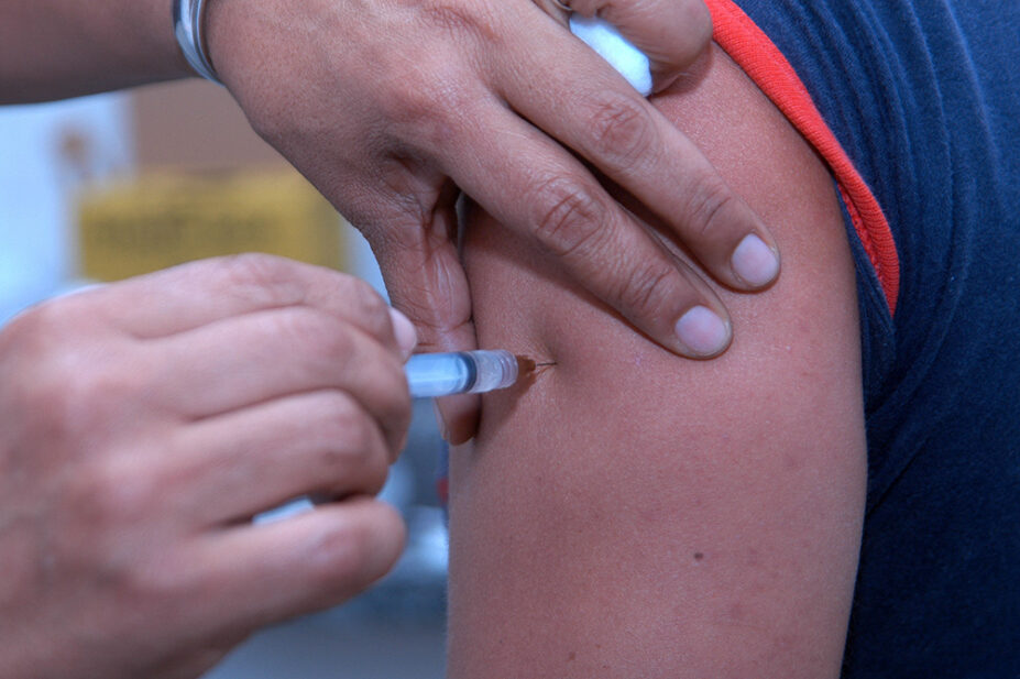 A person receives a vaccination