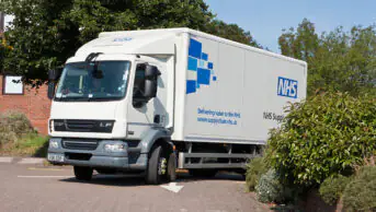 An NHS supply vehicle on a delivery route