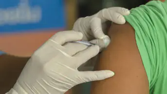 Someone receiving a vaccination