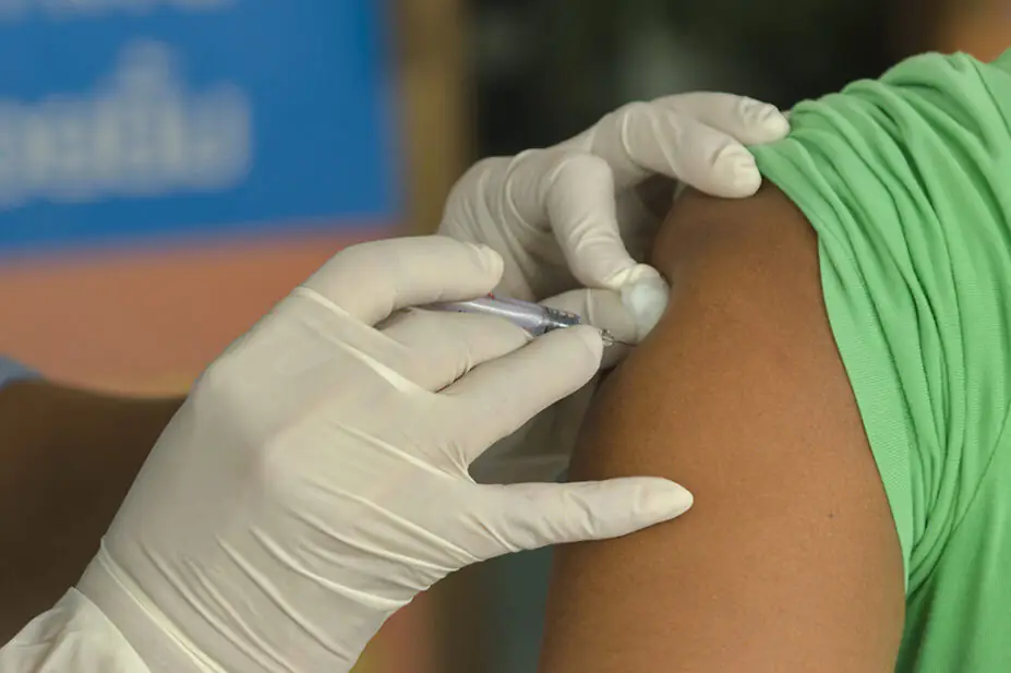 Someone receiving a vaccination