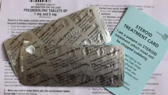 Blister packs of Prednisolone tablets, information leaflet and steroid card