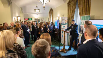 Health minister Zubir Ahmed speaks at a parliamentary event