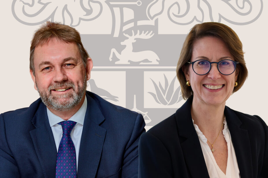 Paul and Karen together against a light brown background with the royal college of pharmacy logo between them