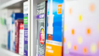 Shelf of allergy treatments in pharmacy