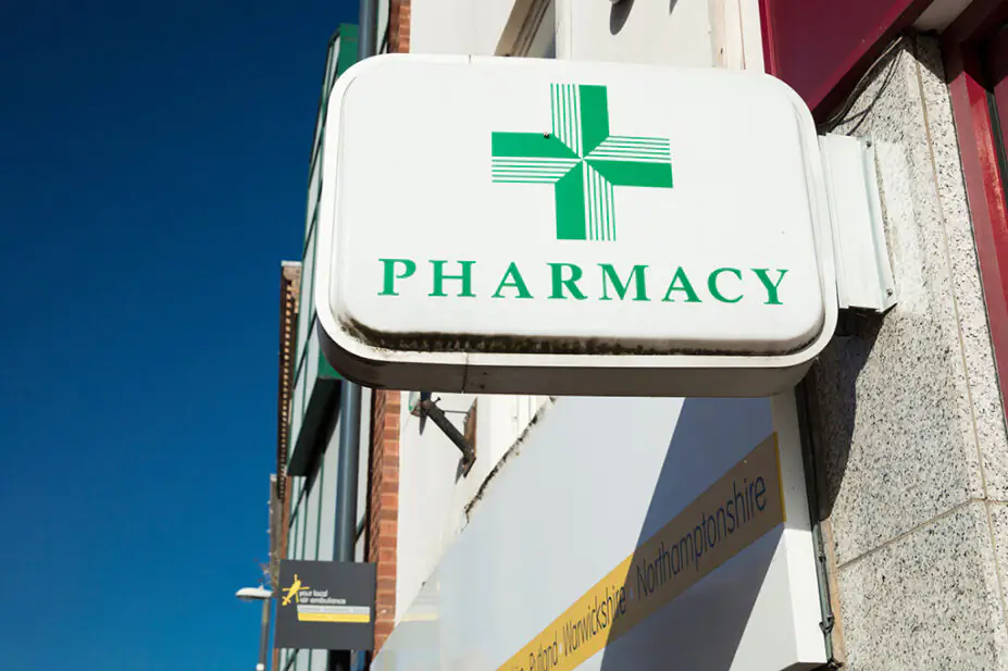 Pharmacy sign outside a UK pharmacy
