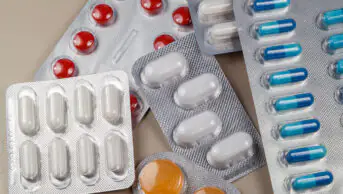 An assortment of blister packs of medication