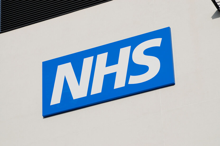 The NHS logo outside of a health centre