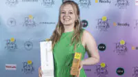 Charlotte Gurr, digital art editor at The PJ, with her award