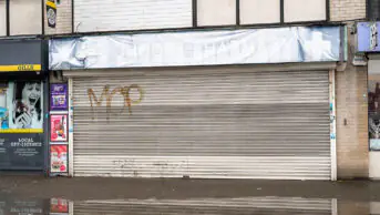 Shutters down on the former Johoots Pharmacy in Langley, Berkshire