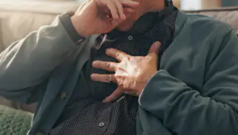 Older male coughing
