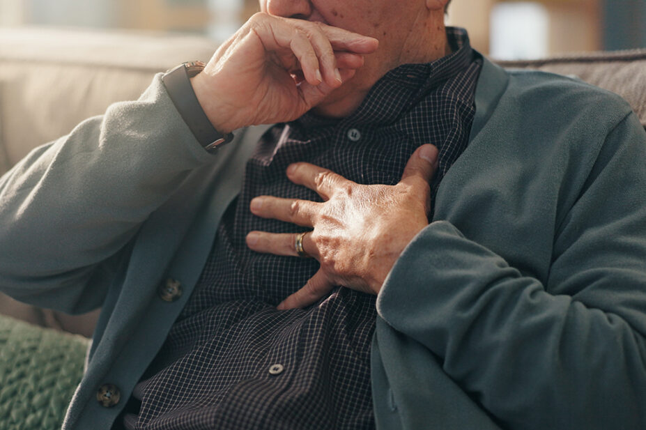 Older male coughing