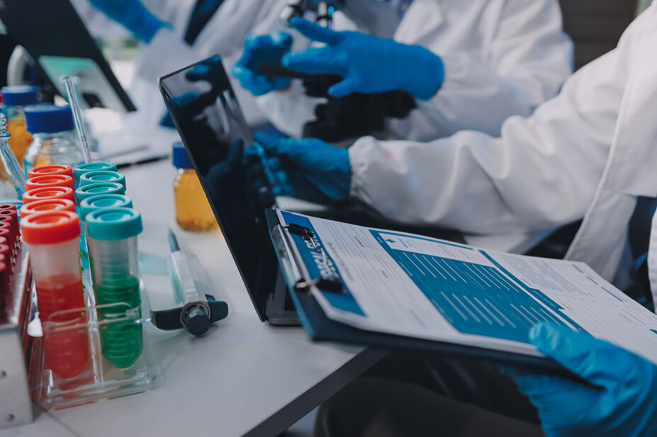 Researchers in laboratory working on drug development