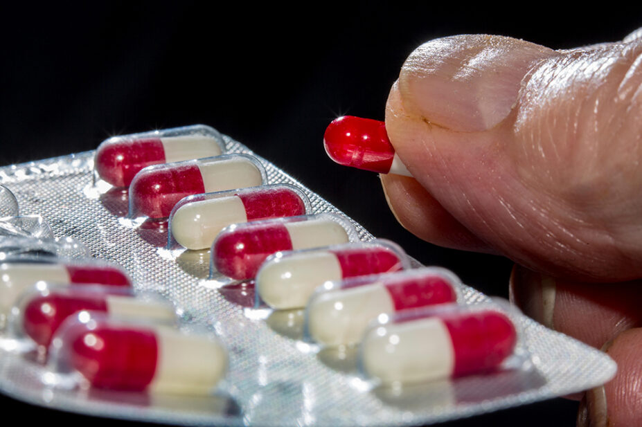 A close-up image of a blister pack of ramipril capsules