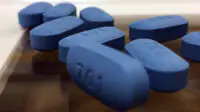 An image of several pre-exposure prophylaxis pills on a table