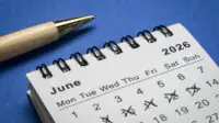 Blue background with pen and calendar showing June 2026 and 5 days crossed out
