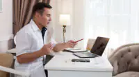 A healthcare professional conducts a online consultation