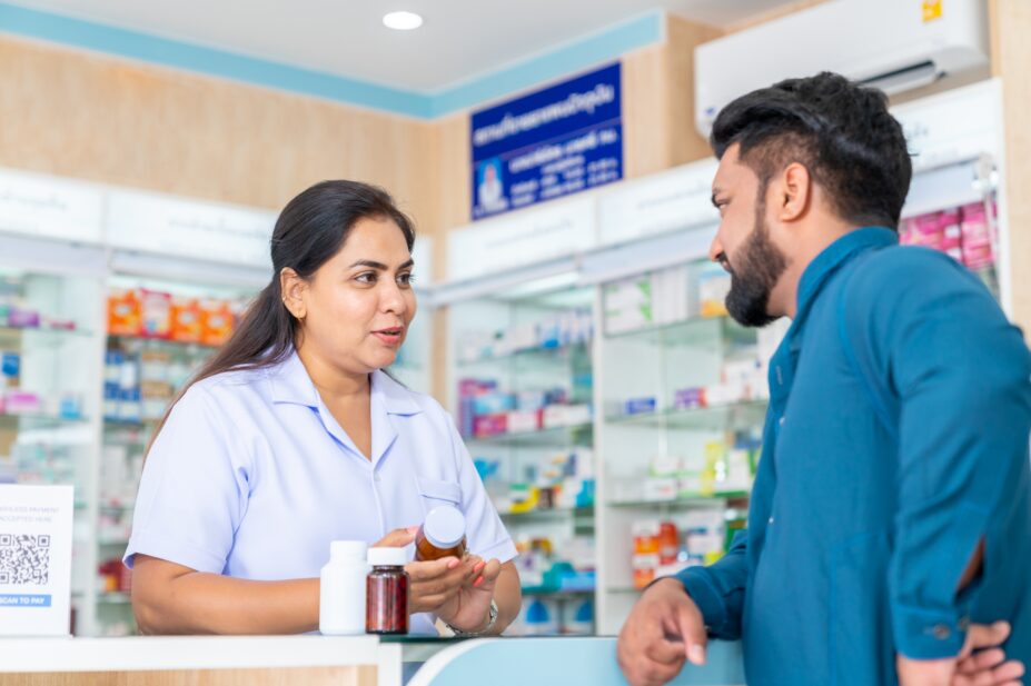 Consultation between a pharmacist and member of the public in a pharmacy
