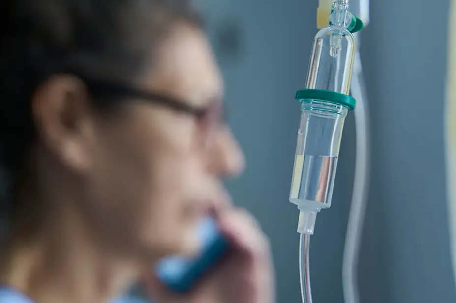 Middle aged woman with IV drip
