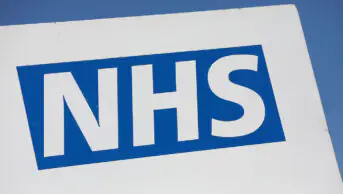 The sign outside of an NHS hospital