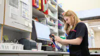 A pharmacist fills a prescription order