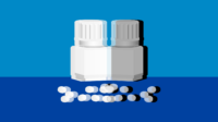 Blue background with pill packet and small round white pills image reflected image with black and white shadow