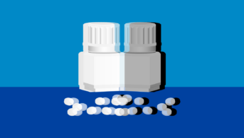 Blue background with pill packet and small round white pills image reflected image with black and white shadow