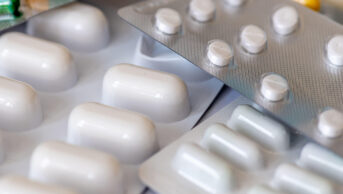 An assortment of blister packs of medicines