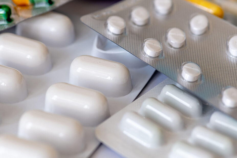 An assortment of blister packs of medicines