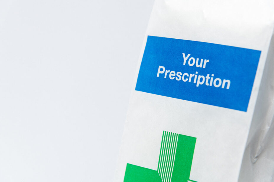 An image of a prescription in a paper bag
