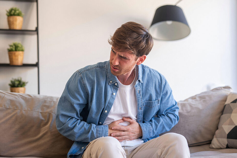 A man suffers from abdominal cramps