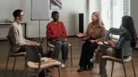 A group of women have a discussion