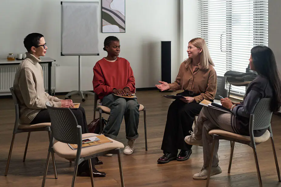 A group of women have a discussion