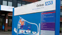 Oxleas NHS Foundation Trust signage outside hospital