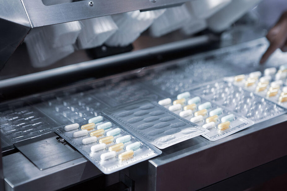 An image of blister packs of medicines being manufactured