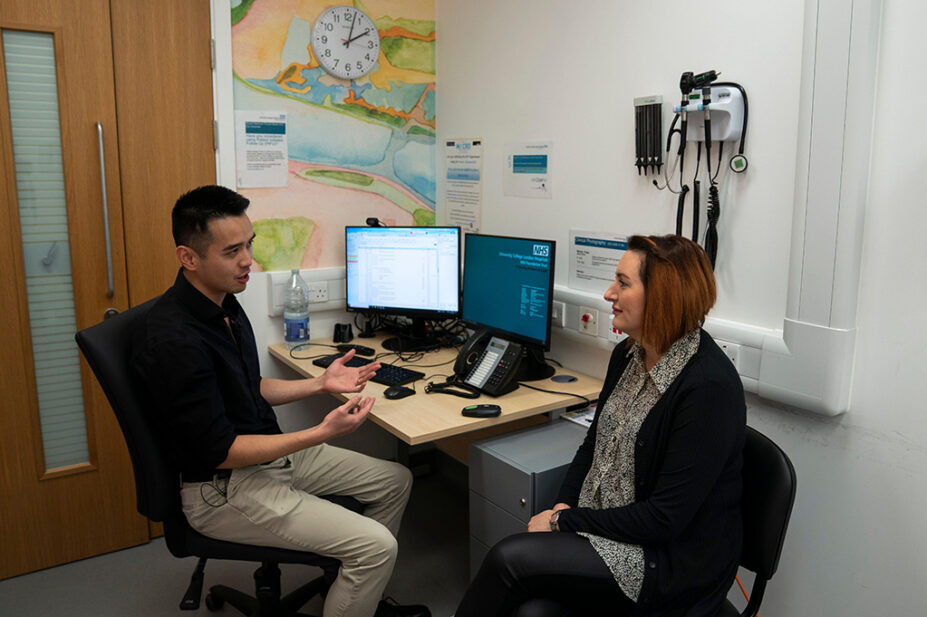 A GP conducts a consultation with a patient