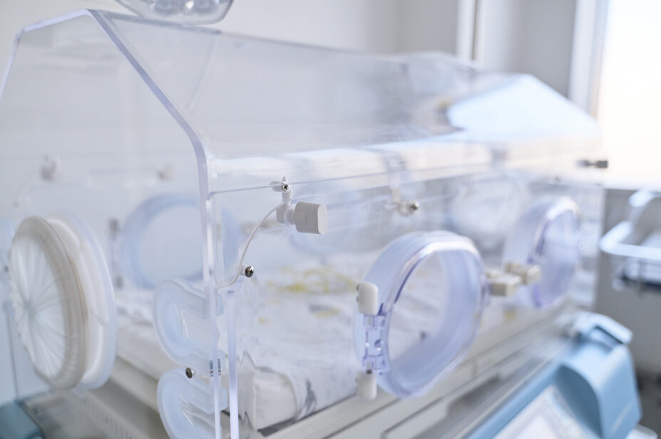 Newborn incubator in a modern neonatal unit during a bright day in a hospital