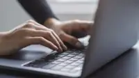 In,The,Blurred,Setting,Of,An,Office,,A,Close-up,Shot
