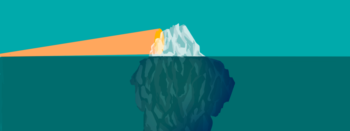 Turquoise ocean with top of iceberg visible and an orange spotlight from the left illuminating it. There remains a lot of iceberg that is invisible beneath the surface
