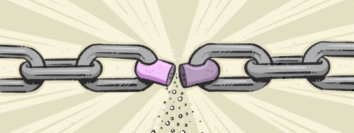 Silver chain with a section as a broken pink pill splitting in half. Beige brown background